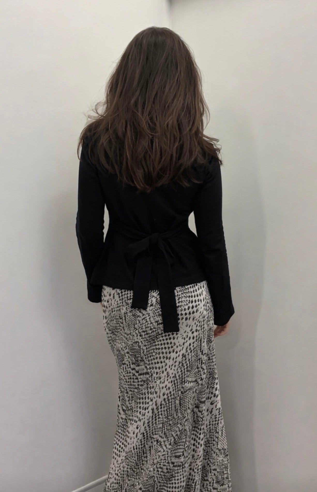 Black flared long sleeve cotton top with tie back detail